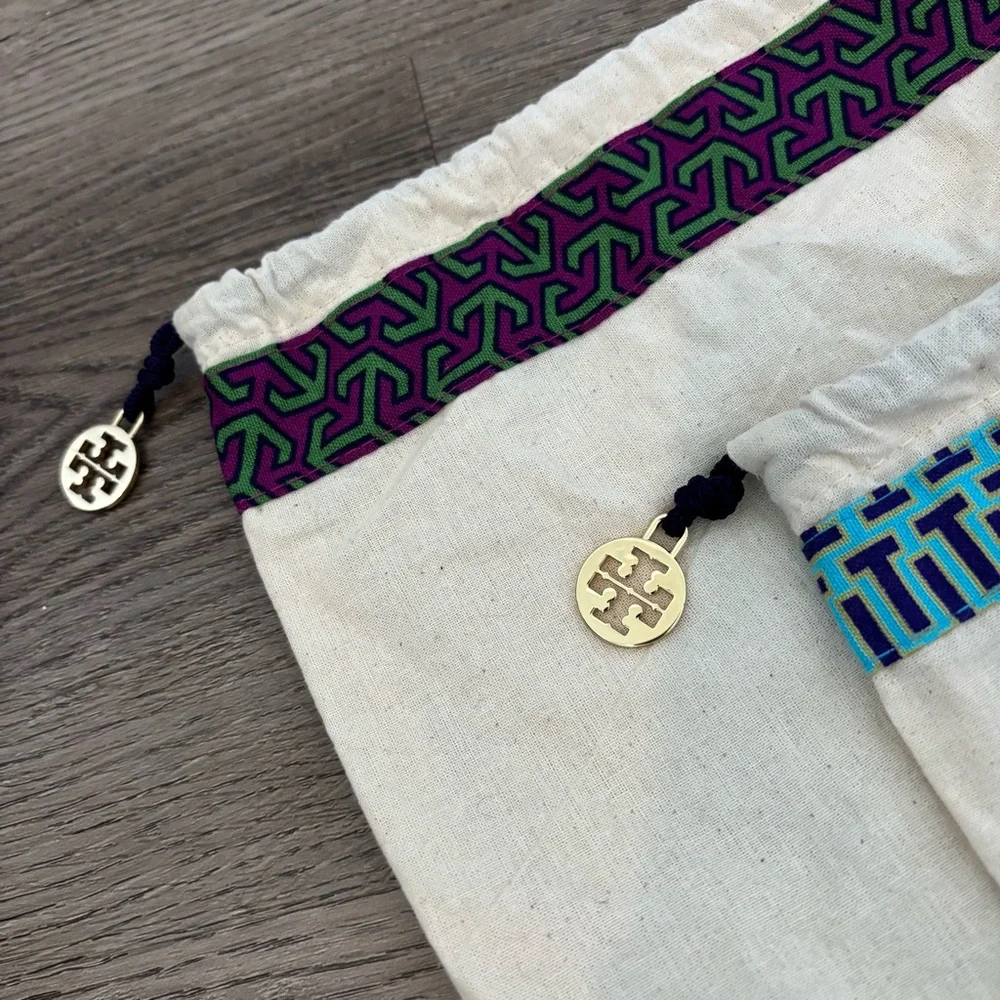 Set of 2 Tory Burch drawstring dust bags, canvas with gold charm
